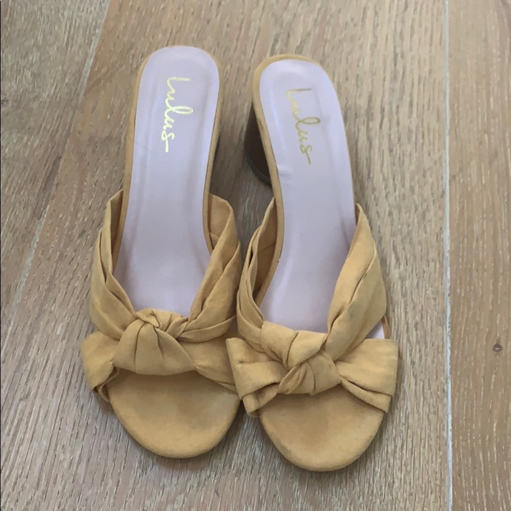 Yellow suede heeled open toe mule